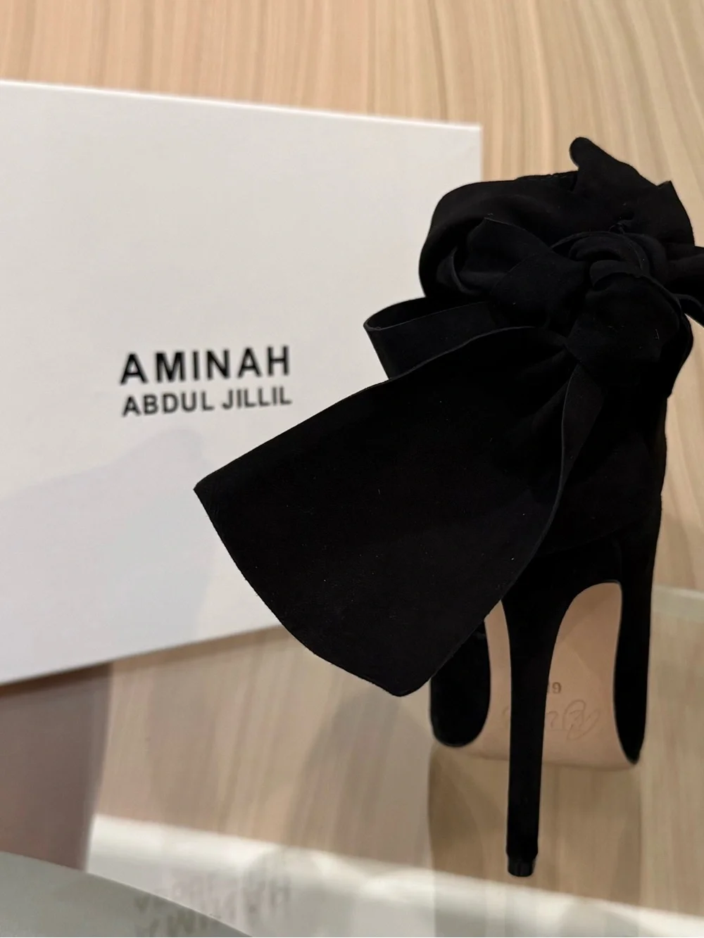 Aminah Abdul Jillil elegant black